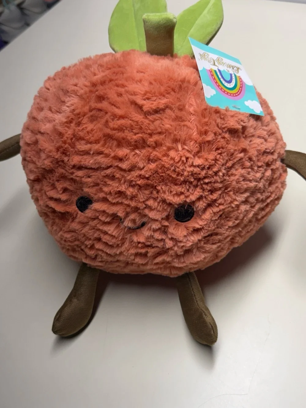 Plush Orange Fruit Character with Green Leaves